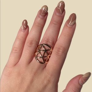 • golden pattern ring with expandable back
